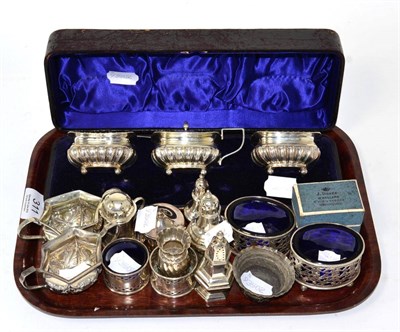 Lot 311 - A Victorian cased three-piece silver cruet set, by JDWD, Chester, 1896; with assorted other...