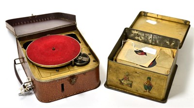 Lot 318 - A Biny child's gramophone together with a tin of small records
