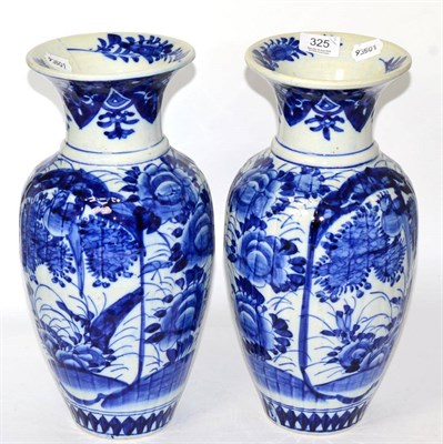 Lot 325 - A pair of Japanese blue and white vases