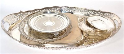 Lot 337 - A large silver plated twin handled tray with pierced gallery and a quantity of other silver...