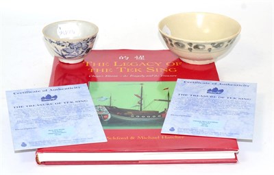 Lot 342 - Two tea bowls from The Tek Sing, Magnolia pattern and circle dot pattern and a book