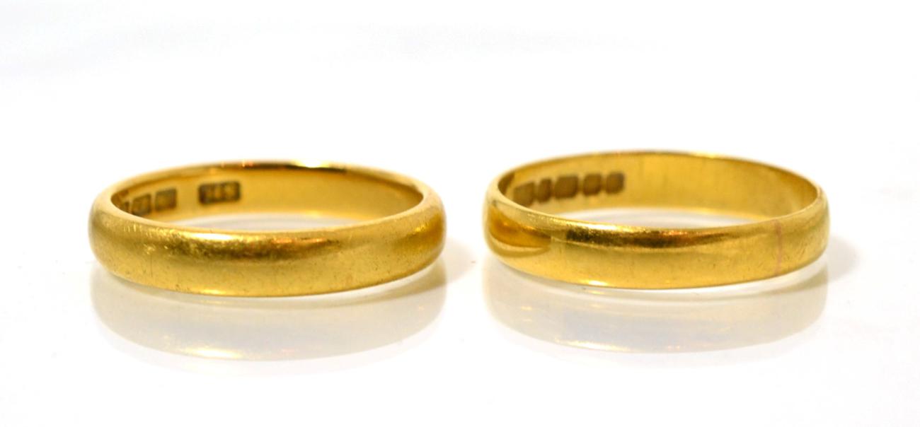 Lot 356 - Two 22 carat gold band rings, finger size L and N (2)