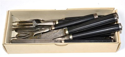 Lot 376 - A composite part set of 18th century French steel and ebony fruit knives and forks, various...