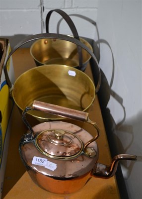 Lot 1152 - A Victorian copper kettle and two brass jam pans