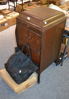 Lot 1157 - A cabinet gramophone with records, needle tin and HMV no.4 sound box