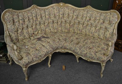 Lot 1162 - A 19th century white painted and parcel gilt corner sofa, in Louis XV style, recovered in...