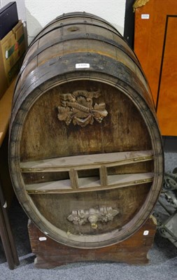 Lot 1166 - A coopered wine barrel on stand