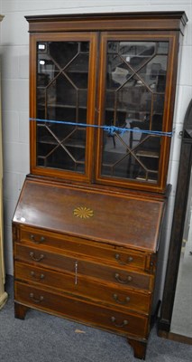 Lot 1177 - An Edwardian inlaid mahogany astragal glazed bureau bookcase