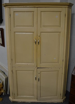 Lot 1178 - A painted pine standing double corner cupboard