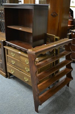 Lot 1191 - A group of furniture comprising a three height chest of drawers, a four tier hanging rack and...