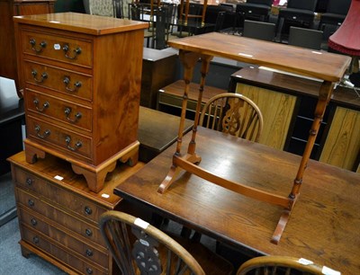 Lot 1195 - Two reproduction yew wood chests of drawers and a similar occasional table (3)