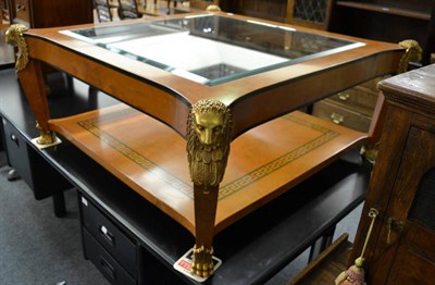 Lot 1210 - An Egyptian revival burr maple, ebony and gilt metal mounted coffee table, modern, with plate glass