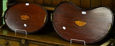 Lot 1239 - Two Edwardian shell inlaid mahogany twin handled trays one reniform the other oval