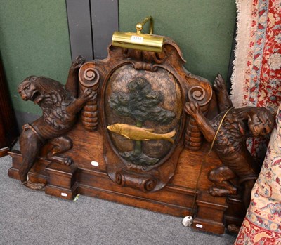 Lot 1244 - An oak sideboard back carved with the crest for Glasgow city