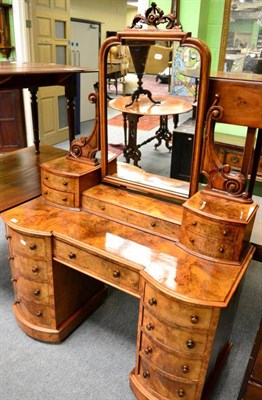 Lot 1261 - A Victorian burr walnut Duchess dressing table