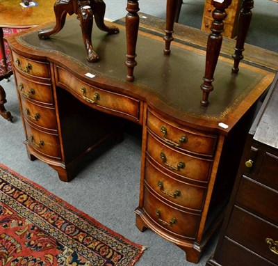 Lot 1271 - A leather inset lady's writing desk