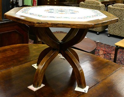 Lot 1272 - An agra Indian pietra dura topped oak table, of octagonal shaped form with floral border and...