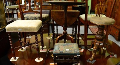 Lot 1277 - An adjustable piano stool, a bobbin turned piano stool and a footstool