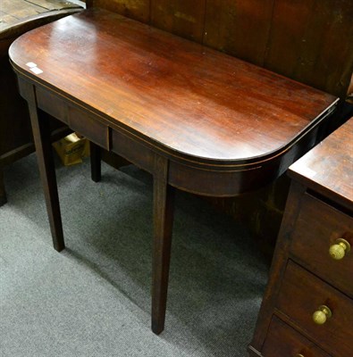 Lot 1283 - A 19th century inlaid mahogany D-end foldover tea table