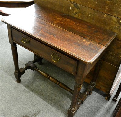 Lot 1285 - An early 19th century provincial oak side table fitted with a drawer