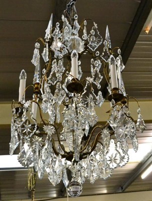 Lot 1304 - A six light lustre drop chandelier