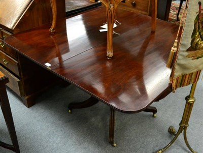 Lot 1330 - A George III mahogany fold over table