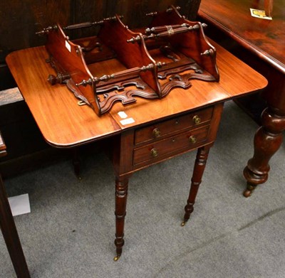 Lot 1334 - A Regency mahogany drop leaf table fitted with two real and two sham drawers, together with a...