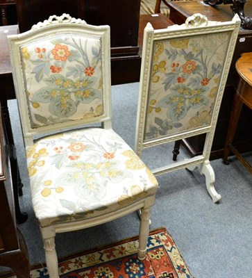 Lot 1349 - A white painted chair together with a similar fire screen each with matching upholstery