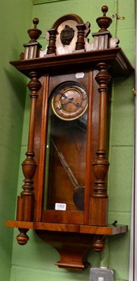 Lot 1362 - A Vienna type walnut veneered striking wall clock