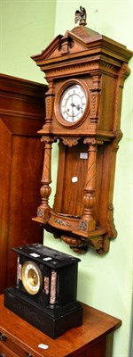 Lot 1368 - An oak striking wall clock and a black slate and marble mantel timepiece