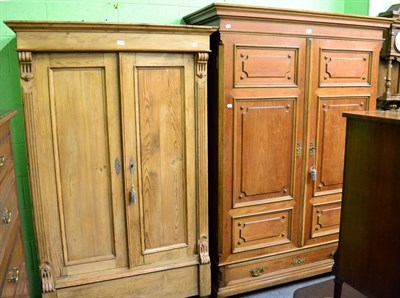 Lot 1372 - A walnut double fronted wardrobe together with another wardrobe