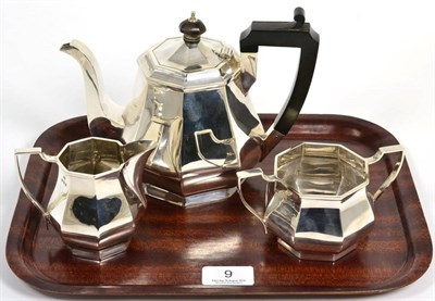 Lot 9 - A three piece silver tea service, Jones & Crompton Birmingham 1927, of octagonal baluster form,...