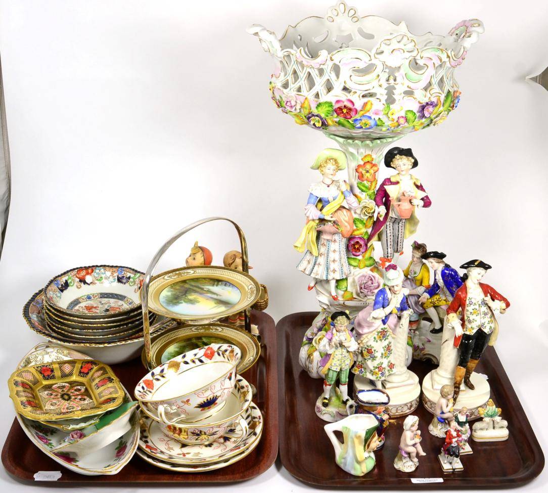 Lot 41 - A floral encrusted figural centre piece; together with a group of Continental porcelain...