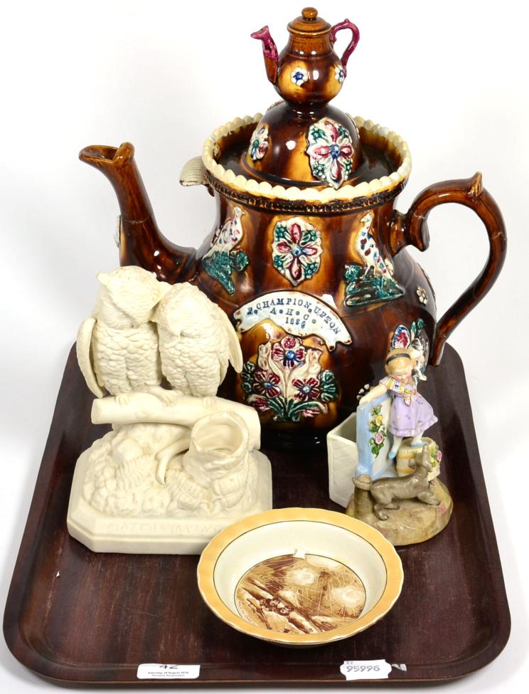 Lot 42 - A large Measham Ware barge teapot and cover labelled E Champion, Upton, A.H.C. 1886 (a.f.); an...