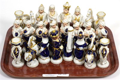 Lot 47 - A Royal Dux figural porcelain chess set after a Meissen design (a.f.)