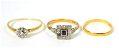 Lot 80 - An Art Deco sapphire and diamond cluster ring, a square cut sapphire within a diamond set...