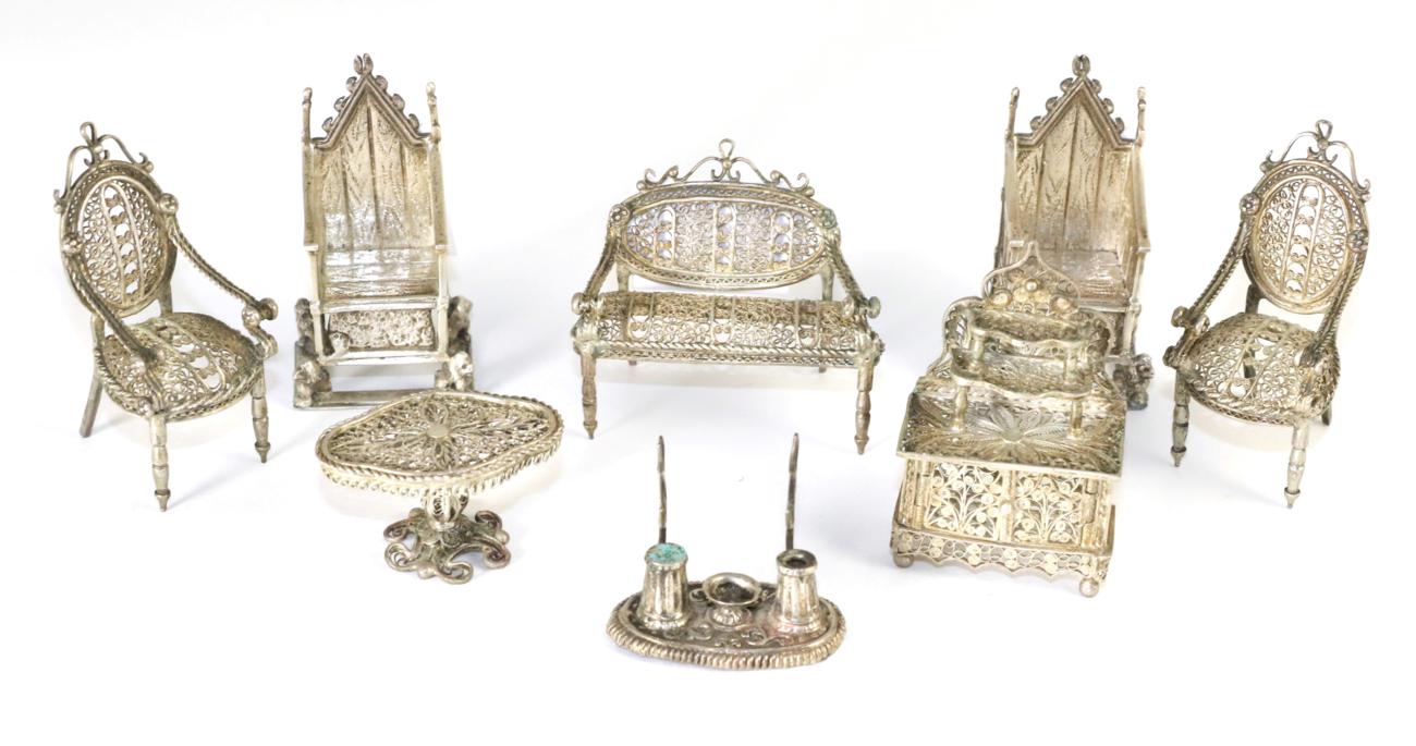 Lot 92 - A pair of silver miniature throne chairs; together with various filigree miniature furniture;...