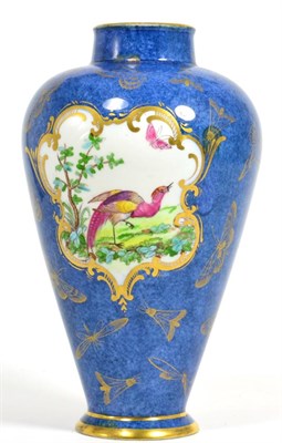 Lot 101 - A blue ground gilt decorated vase with a central panel depicting two birds, underside marked...