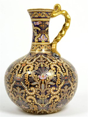 Lot 107 - A Victorian gilt and enamel jewelled ewer, possibly Copeland