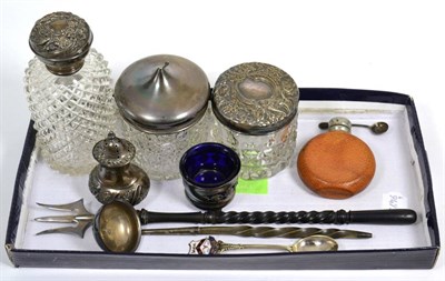 Lot 120 - A silver topped glass scent bottle, two silver topped glass jars, silver mounted ladle and...