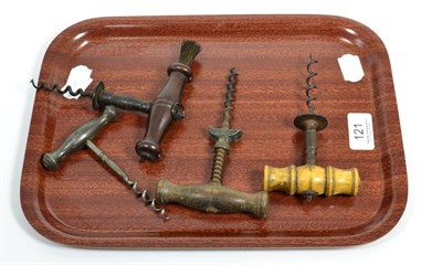 Lot 121 - Four corkscrews one with bone handle, two with wooden and one metal (all F-G) (4)