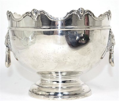 Lot 186 - A twin handled silver pedestal bowl, marks indistinct, Chester, early 20th century, of Monteith...