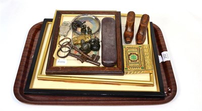 Lot 202 - A pair of treen boot puzzles; a mother of pearl handled cut throat razor in a fitted case; a set of