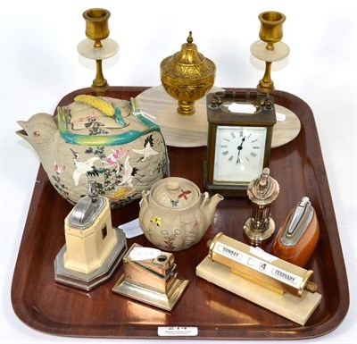 Lot 214 - An onyx and gilt metal desk set comprising an inkwell and a pair of candlesticks; a desk...