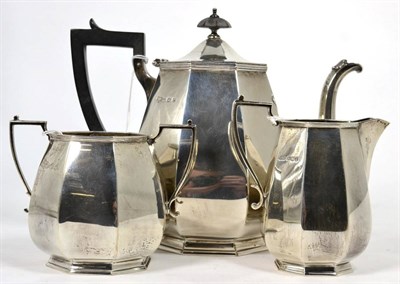 Lot 216 - A composite silver three piece tea service, James Dixon & Sons, Sheffield, 1936 and Goldsmiths...