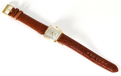 Lot 232 - A wristwatch signed Olma, case stamped 18K 0.750, on a brown leather strap