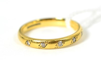 Lot 241 - An 18 carat gold diamond half hoop ring, inset with five round brilliant cut diamonds, total...