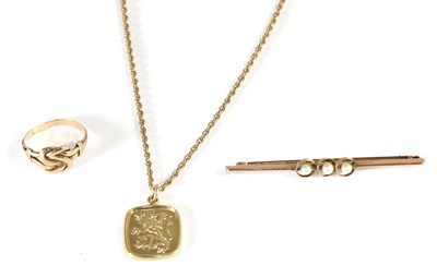 Lot 243 - A 9 carat gold rampant lion pendant on chain, measures 2cm by 1.5cm, chain length 45cm; a...