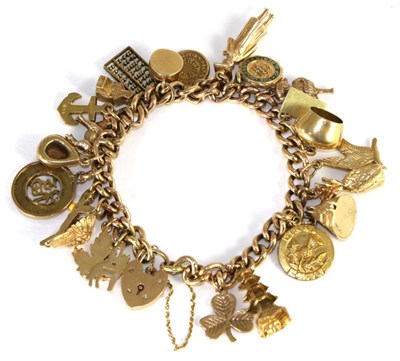 Lot 250 - A 9 carat gold curb link charm bracelet, suspending 23 various charms