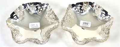 Lot 289 - A pair of silver pierced dishes, S J Levi & Co, Birmingham 1934, 18cm wide, 16ozt